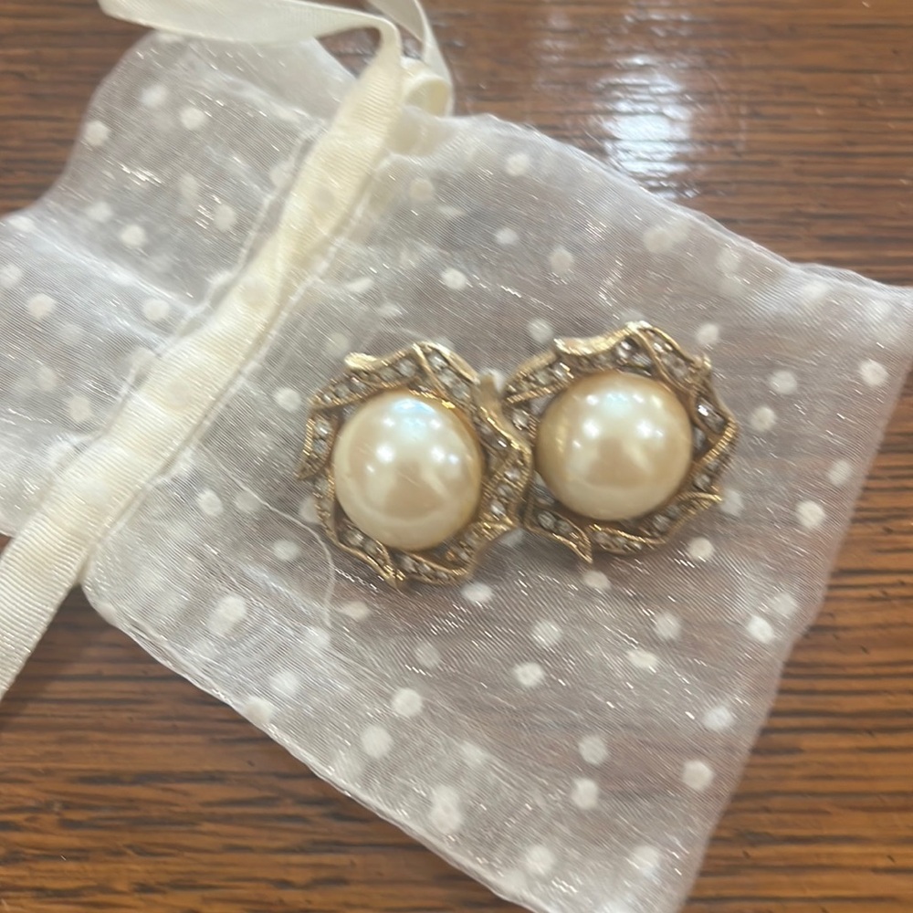 Post pierced pearl earrings